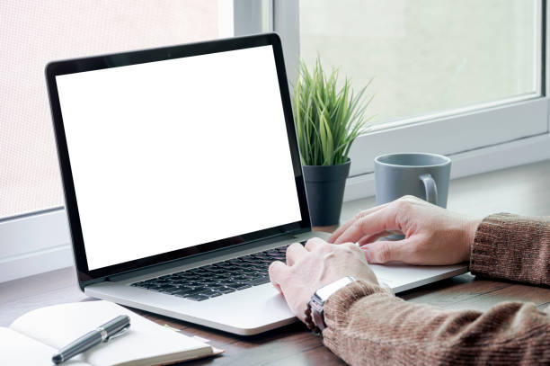 istock Cropped shot of man hand working on laptop computer at home office. 1359612963