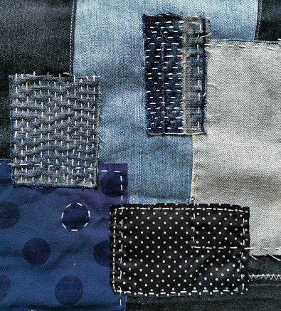 Mixed fabric patch work, denim jeans, blue polka dot pattern printed, black denim and white stitched decoration