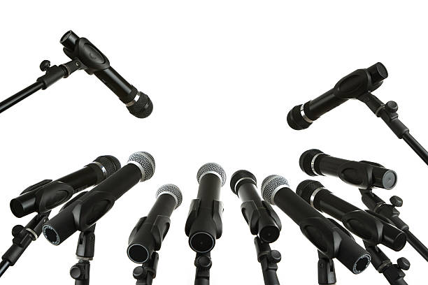 Press conference Many microphones isolated on white background microphone stand photos stock pictures, royalty-free photos & images