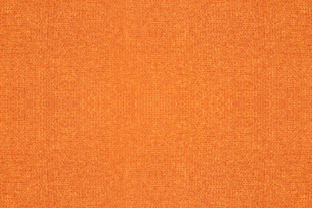 istock Rich orange color woven cloth texture surface for background 1359623639