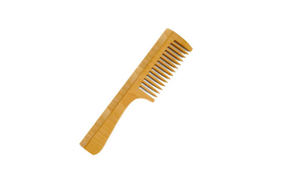 istock Wooden comb isolated on a white background 1359627567