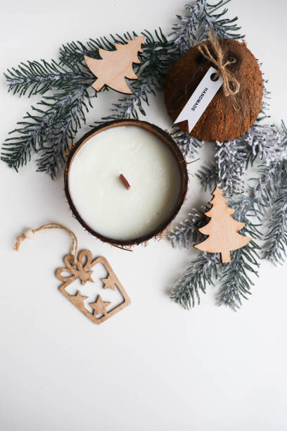 istock original decorative handmade candle in a coconut. natural soy wax candle 1359628513