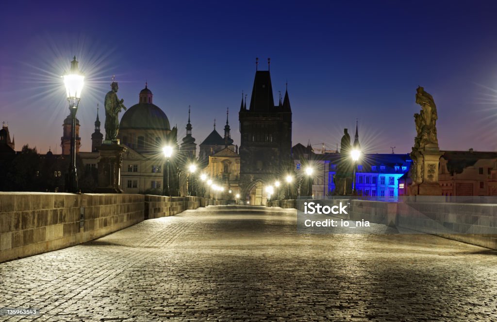 Prague Charles bridge at night Prague Charles bridge at dawn Architecture Stock Photo