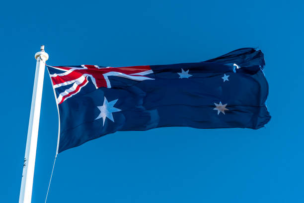 istock Australian Flag blowing in the wind 1359636200