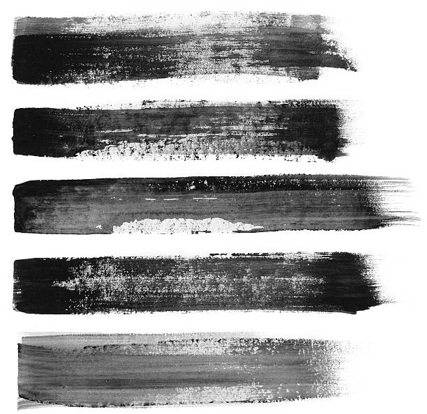 Five different black paint brush strokes on white stock photo