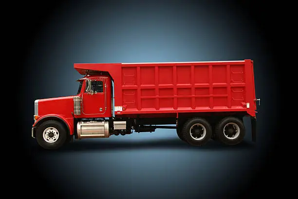 Peterbuilt Red Dump Truck. Background is ready for use or display without further work.