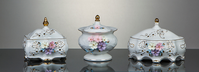 Elegantes porcelain tableware in a dramatic modern setting