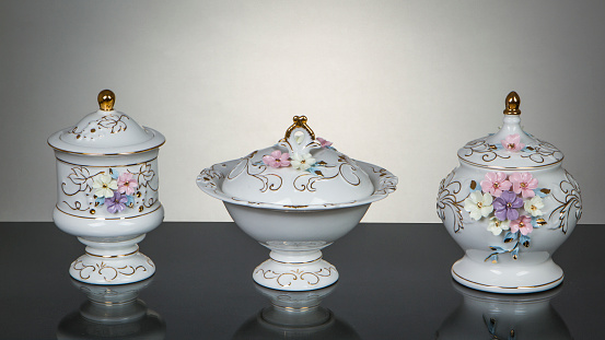 Elegantes porcelain tableware in a dramatic modern setting