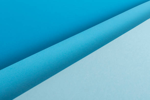 istock Colorful blue folded paper material design. Top view, flat lay 1359648237