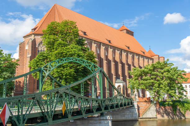 Wroclaw, Poland - crossed by the Oder River, Wroclaw displays a large number of colorful bridges, which are a main landmark of the town. Here in particular one of the iron bridges in the Old Town