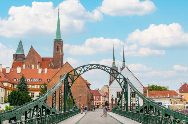 Wroclaw, Poland - crossed by the Oder River, Wroclaw displays a large number of colorful bridges, which are a main landmark of the town. Here in particular one of the iron bridges in the Old Town
