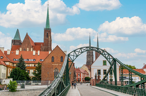 Wroclaw, Poland - crossed by the Oder River, Wroclaw displays a large number of colorful bridges, which are a main landmark of the town. Here in particular one of the iron bridges in the Old Town