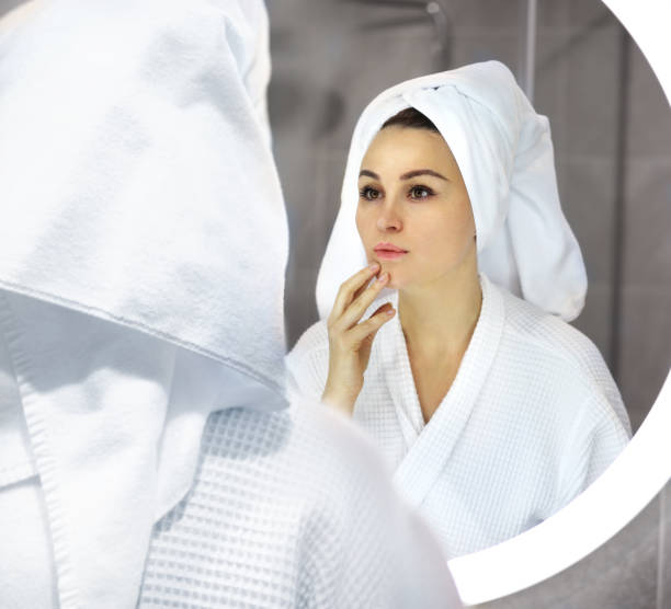 istock Magic anti-aging cream.Applying the cream. 1359655747