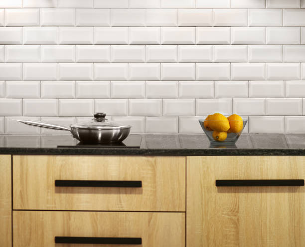 istock Steel pan and stewpan standing on kitchen stove 1359655892