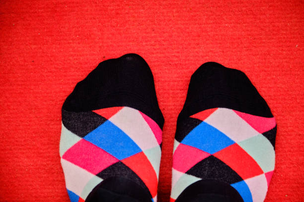 istock casual male, colorful socks, triangle shaped 1359656907