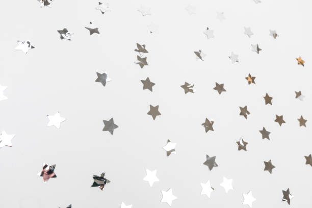 istock star silver confetti on white background flat lay text place - Image 1359657094