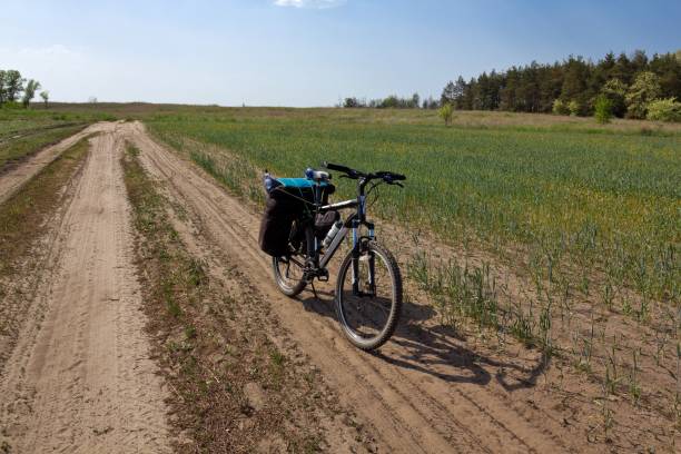 istock bicycle on a rural road 1359660189