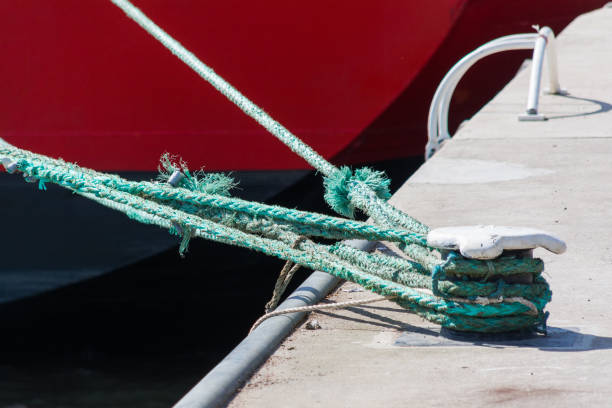 istock Green hawsers on a bollard 1359666966