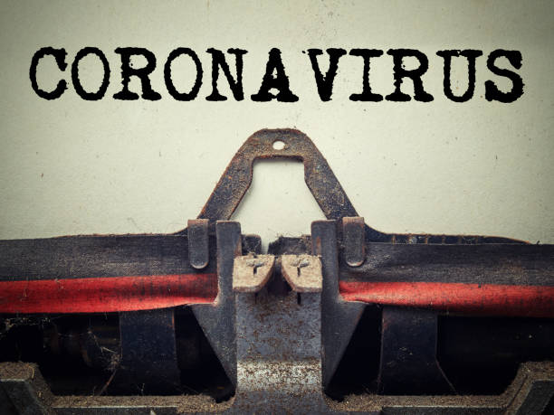 istock Coronavirus typed on retro typewriter close up. Covid-19 new omicron virus variant 1359668500