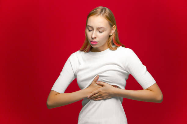 istock Sick young girl pressing on chest suffering sudden ache, heart attack, cardiac problems, intercostal neuralgia 1359669194