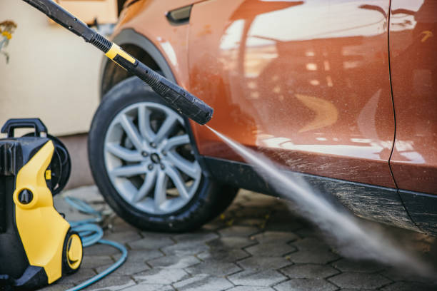 istock Cleaning Car with water,using High Pressure cleaner water 1359669386