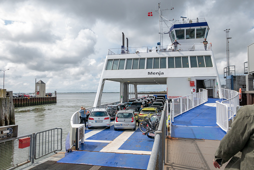 the passenger and car ferry named Menja is ready for departure. the ferry runs between Esbjerg in Jutland and Nordby on the island of Fanø. 07/31/2021 - 6700 Esbjerg, Jutland, Denmark