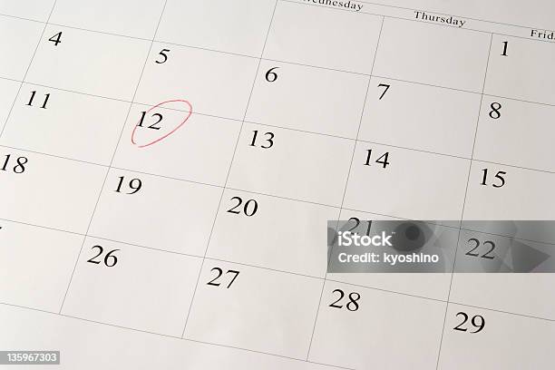 Setting A Date On Calendar By Red Pen Stock Photo - Download Image Now - Calendar, Circle, Anticipation