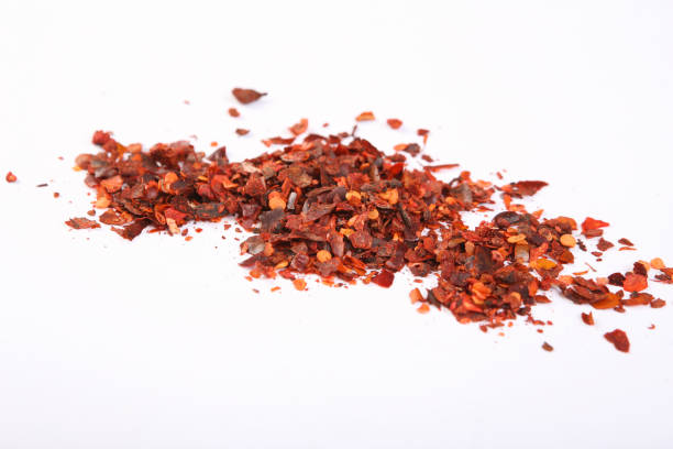 istock Dry red chili pepper spice isolated on white background 1359675800