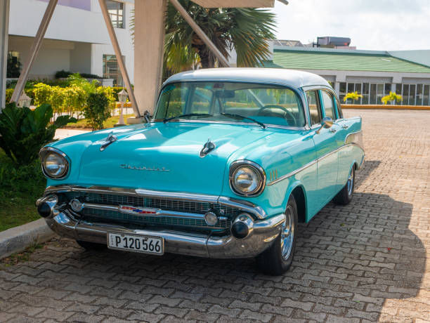 chevrolet bel air car is parked outside a cuban hotel tryp cayo coco. - collectors car front view chevrolet bel air horizontal imagens e fotografias de stock