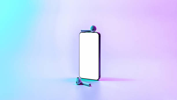 istock Mockup device. Mobile smart phone technology blank screen. Mock up audio headphones equipment on neon gradient background. Game design, smartphone application presentation or portfolio mockups. 1359678010