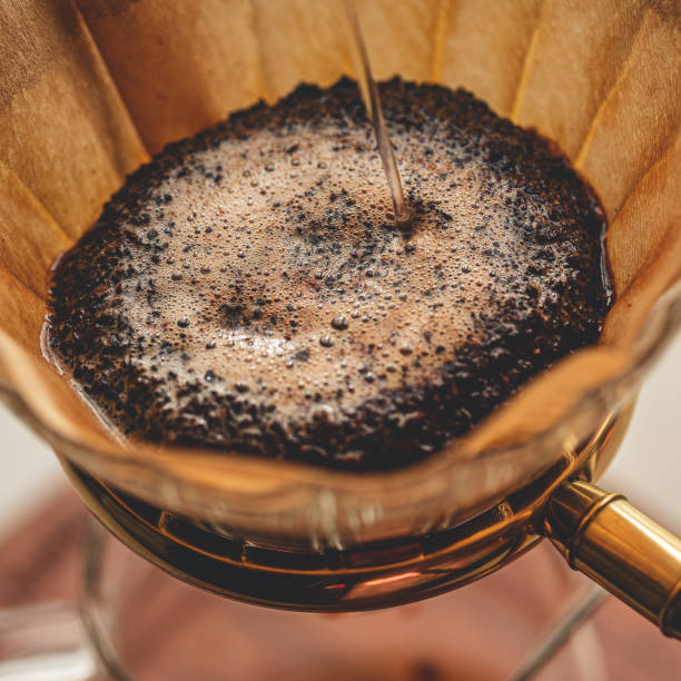 Make Pour-over Coffee,Pour Hot Water Into Coffee Powder Make Pour-over Coffee,Pour Hot Water Into Coffee Powder coffee filter stock pictures, royalty-free photos & images