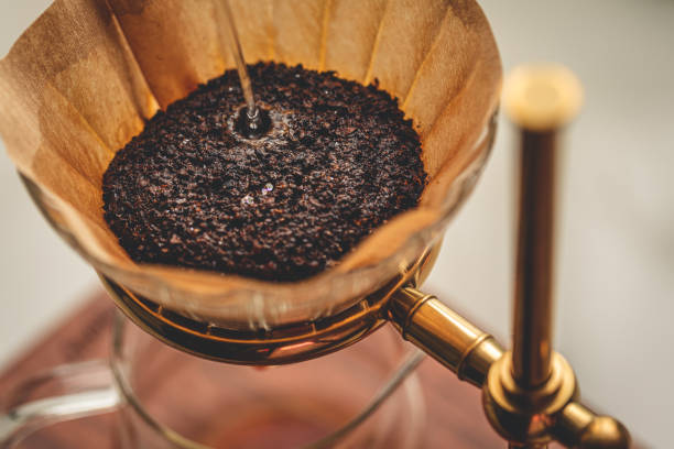 istock Make Pour-over Coffee,Pour Hot Water Into Coffee Powder 1359679821
