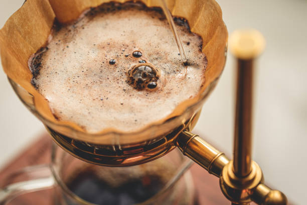 istock Make Pour-over Coffee,Pour Hot Water Into Coffee Powder 1359679854