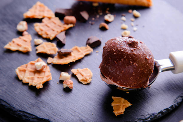 istock A scoop of chocolate ice cream on a dark background 1359684803