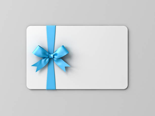 istock Blank white gift card with blue ribbon bow isolated on gray background with shadow minimal concept 3D rendering 1359687298