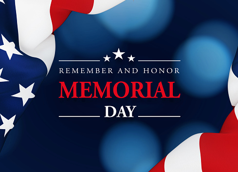 Memorial Day message written over dark blue background in the midst rippled American flag. Horizontal composition with copy space. Directly above. US Memorial Day concept.