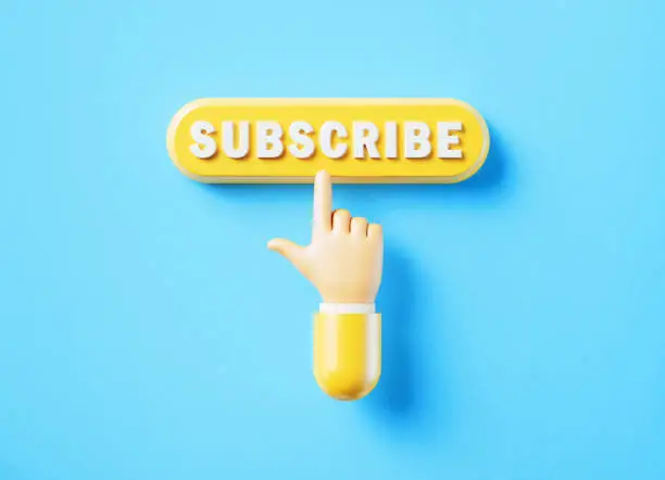 Photo of Cartoon Style Human Hand Clicking Over A Yellow Push Button: Subscribe Reads On Push Button