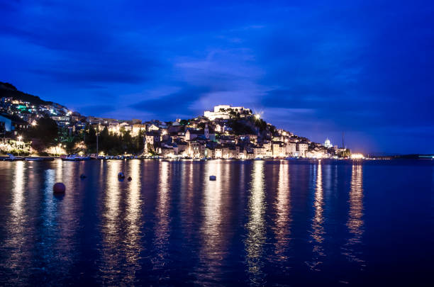 istock Illuminated at night Mediterranean town in Croatia 1359690293