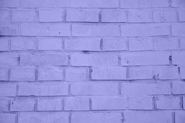 istock Blue brick wall background. Detail of a white brick wall texture 1359693925