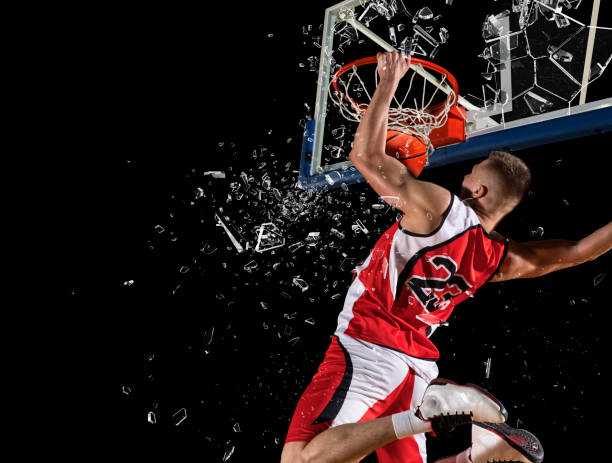 Basketball player players in action. Shattered backboard