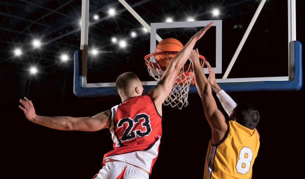 istock Two basketball players in action 1359695102