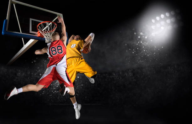 istock Basketball players in action 1359695106