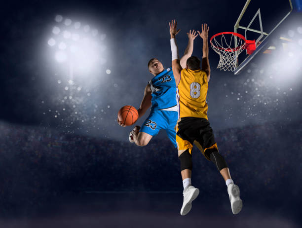 istock Two basketball players in action 1359695113