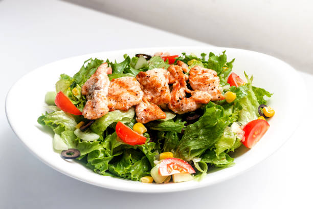 istock Salmon fillets grilled salad dressing bowl 1359697412