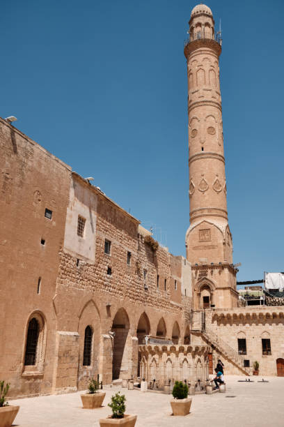 Minaret and courtyard of Grand Mosque of Mardin Minaret and courtyard of Grand Mosque of Mardin. Mardin Ulu Camii, Turkey ulu camii stock pictures, royalty-free photos & images