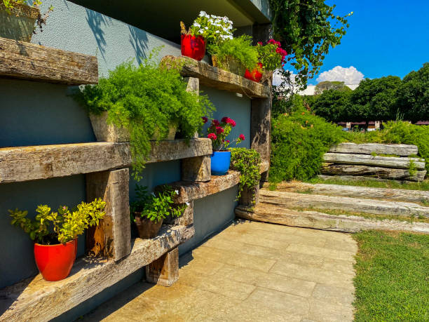 istock Landscaping on a garden wall, Pots and flowers 1359704738