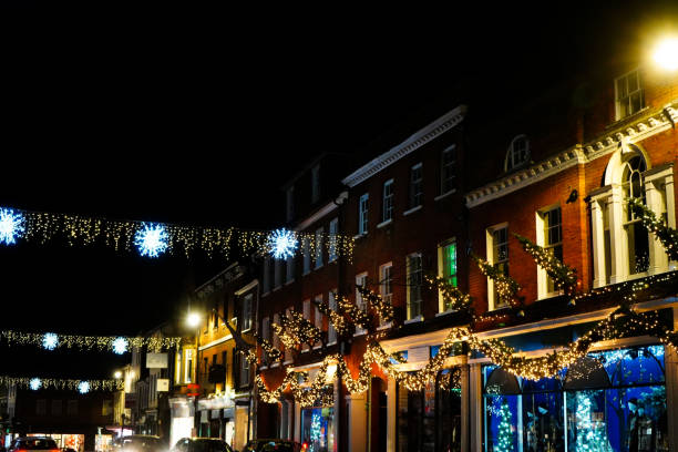 istock Christmas lights in a town centre high up 1359704831