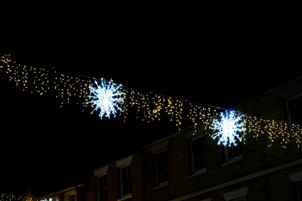 istock Christmas lights in a town centre high up 1359704850