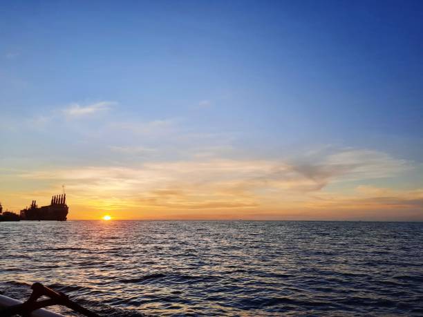 istock Sunset on the sea 1359710739