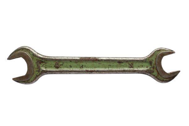 Old metal wrench. Close-up. Horizontal side view. The isolated object on a white background. Isolate.